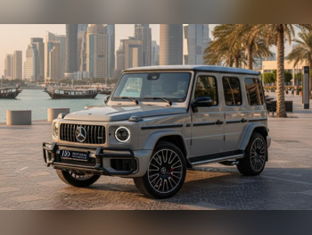 مرسيدس - بنز  جي - كلاس  63 اي ام جي  2025  اوتوماتيك  12,500 كم  8 سلندر  دفع رباعي  اس يو في  رمادي
