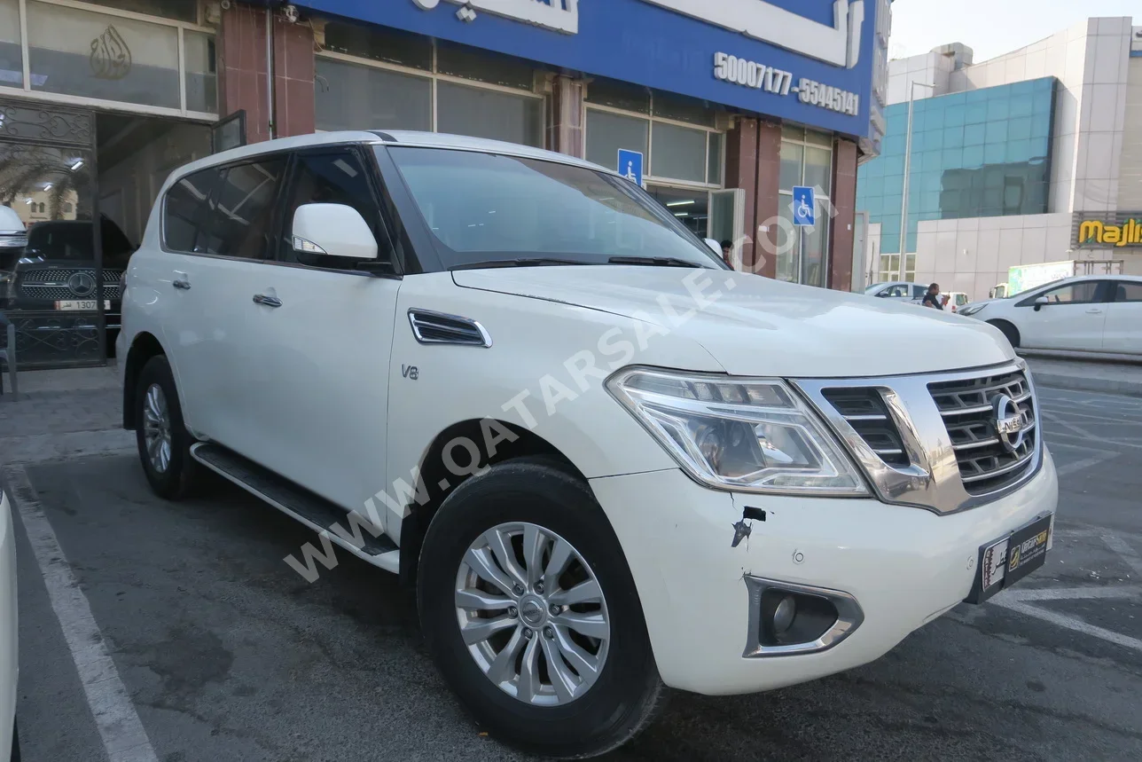 Nissan  Patrol  SE  2014  Automatic  318,000 Km  8 Cylinder  Four Wheel Drive (4WD)  SUV  White