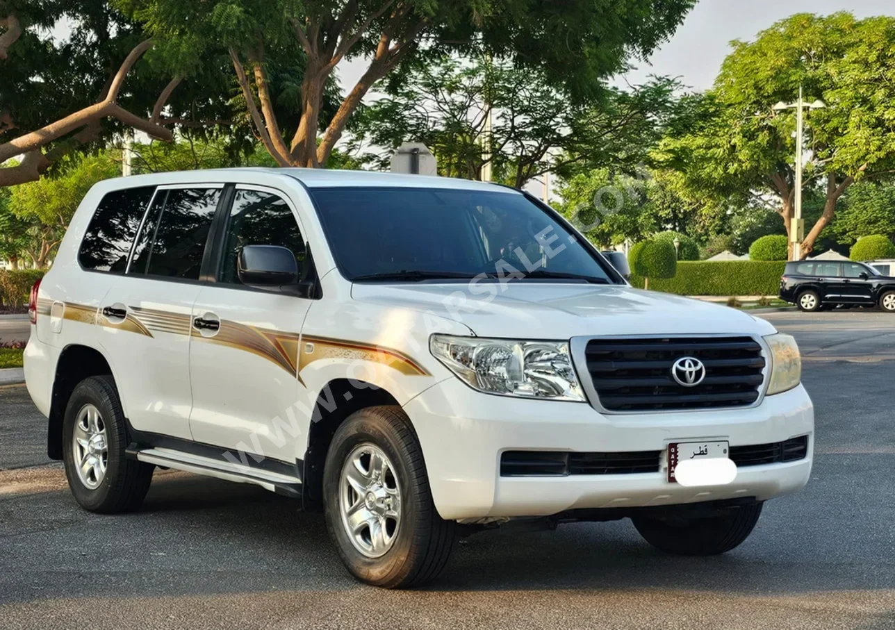 تويوتا لاند كروزر جي 2009 اوتوماتيك 300,000 كم 6 سلندر دفع رباعي اس يو في أبيض