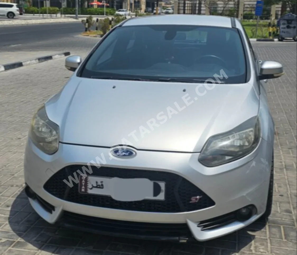 Ford  Focus  ST  2014  Manual  183,000 Km  4 Cylinder  Front Wheel Drive (FWD)  Hatchback  Silver