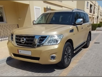 Nissan  Patrol  Platinum  2014  Automatic  144,500 Km  8 Cylinder  Four Wheel Drive (4WD)  SUV  Gold