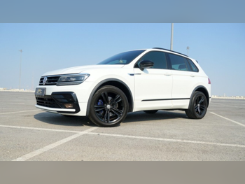 Volkswagen  Tiguan  R-Line  2019  Automatic  65,000 Km  4 Cylinder  All Wheel Drive (AWD)  SUV  White