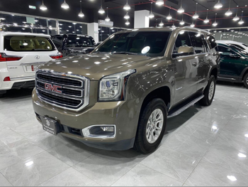 GMC  Yukon  SLE  2016  Automatic  246,000 Km  8 Cylinder  Rear Wheel Drive (RWD)  SUV  Olive Green