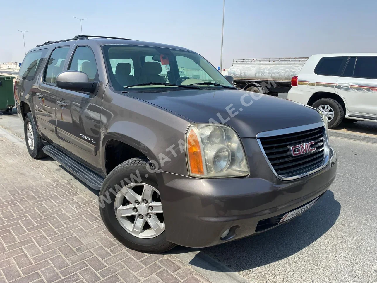 GMC  Yukon  2012  Automatic  186,000 Km  8 Cylinder  Rear Wheel Drive (RWD)  SUV  Brown