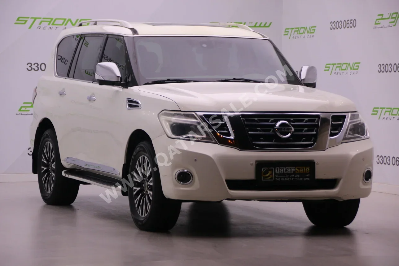 Nissan  Patrol  Platinum  2012  Automatic  305,000 Km  8 Cylinder  Four Wheel Drive (4WD)  SUV  White