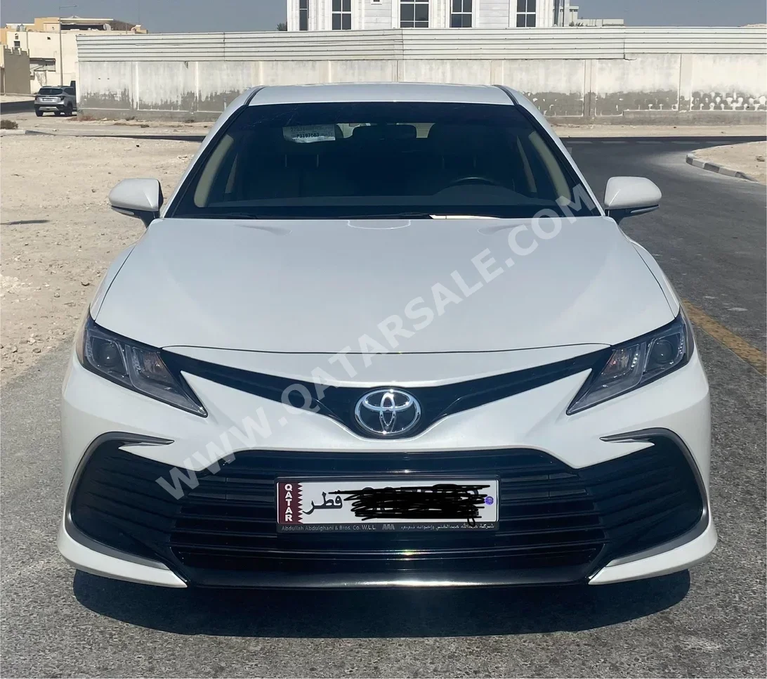 Toyota  Camry  LE  2023  Automatic  16,000 Km  4 Cylinder  Front Wheel Drive (FWD)  Sedan  White  With Warranty