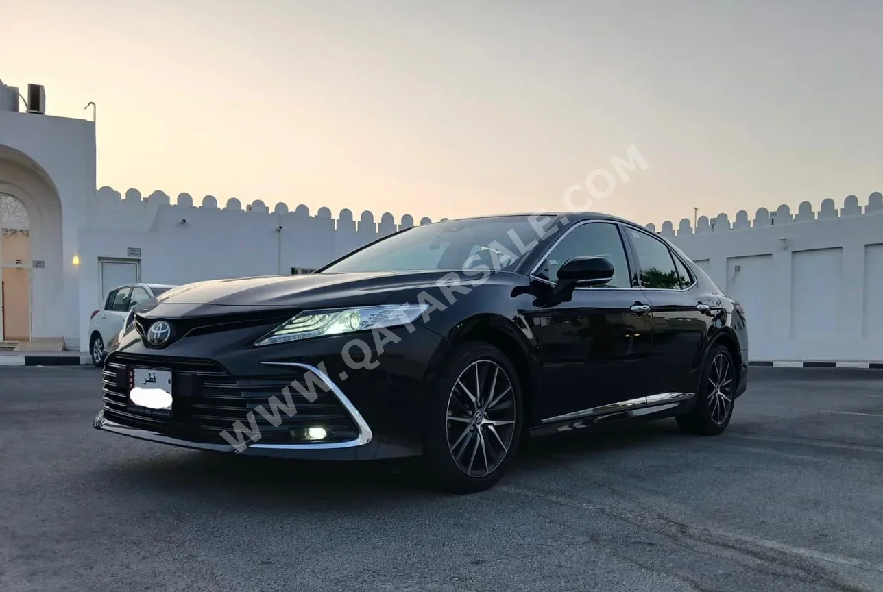 Toyota  Camry  Limited  2024  Automatic  30,000 Km  6 Cylinder  Front Wheel Drive (FWD)  Sedan  Black