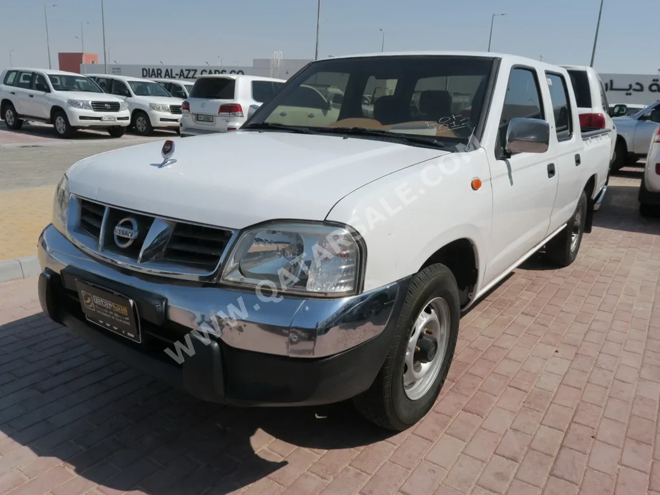 Nissan  Pickup  2012  Manual  229,000 Km  4 Cylinder  Rear Wheel Drive (RWD)  Pick Up  White