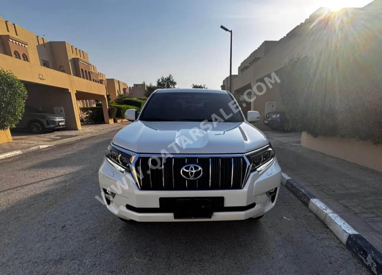 Toyota  Prado  TXL  2023  Automatic  32,145 Km  6 Cylinder  Four Wheel Drive (4WD)  SUV  Pearl  With Warranty