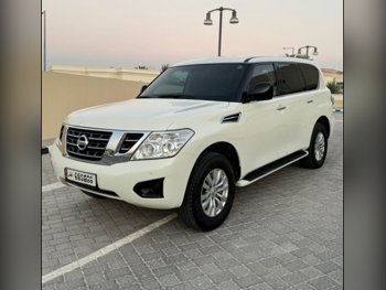 Nissan Patrol XE 2019 Automatic 128,000 Km 6 Cylinder Four Wheel Drive (4WD) SUV White
