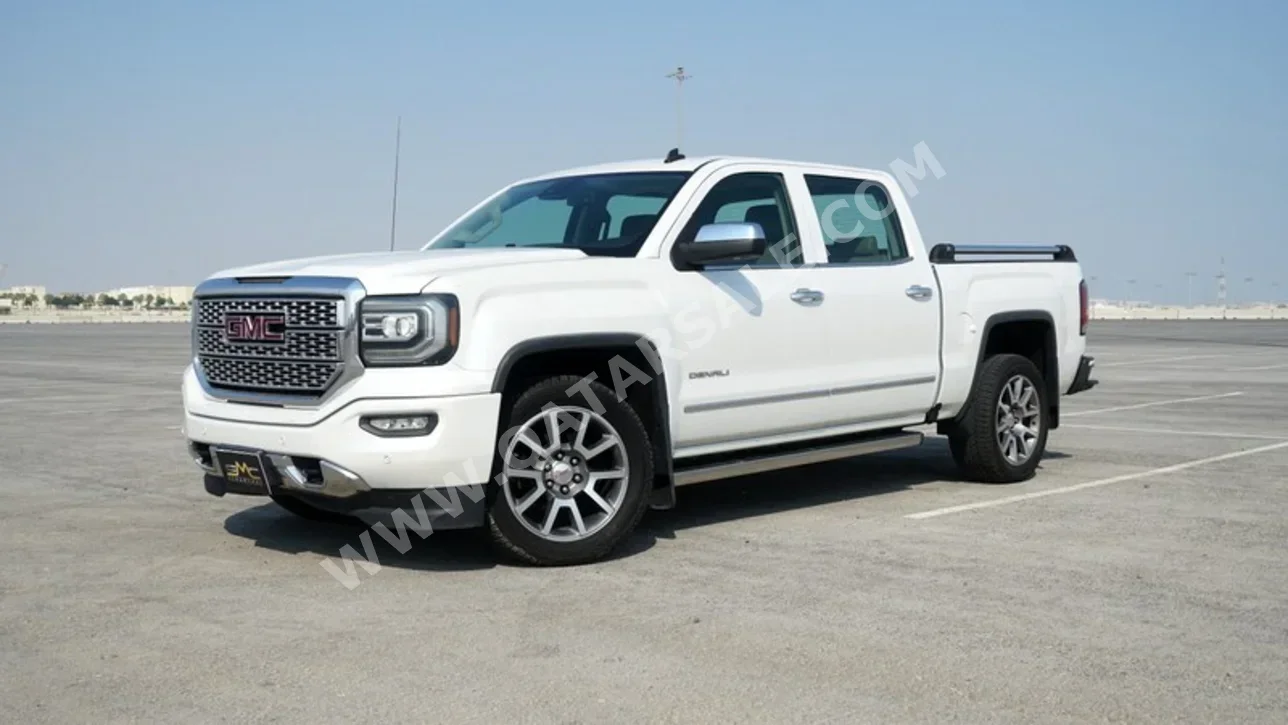 GMC  Sierra  Denali  2016  Automatic  168,000 Km  8 Cylinder  Four Wheel Drive (4WD)  Pick Up  White