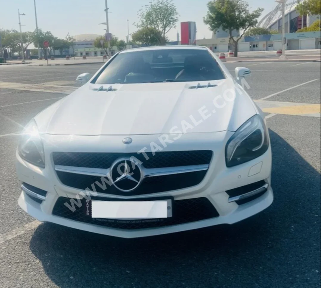 مرسيدس - بنز  اس ال  500  2013  اوتوماتيك  128,829 كم  8 سلندر  دفع خلفي  كشف  أبيض