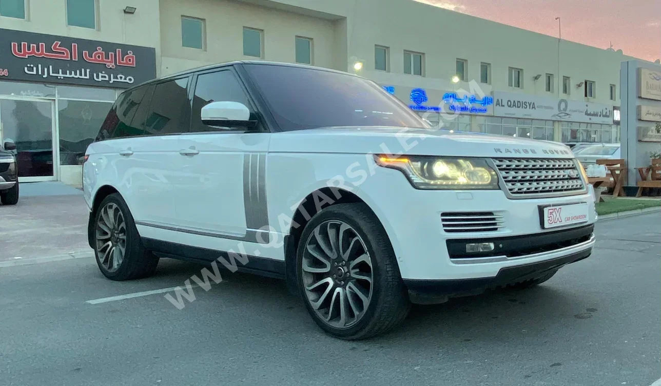 Land Rover  Range Rover  Vogue SE  2014  Automatic  176,000 Km  8 Cylinder  Four Wheel Drive (4WD)  SUV  White