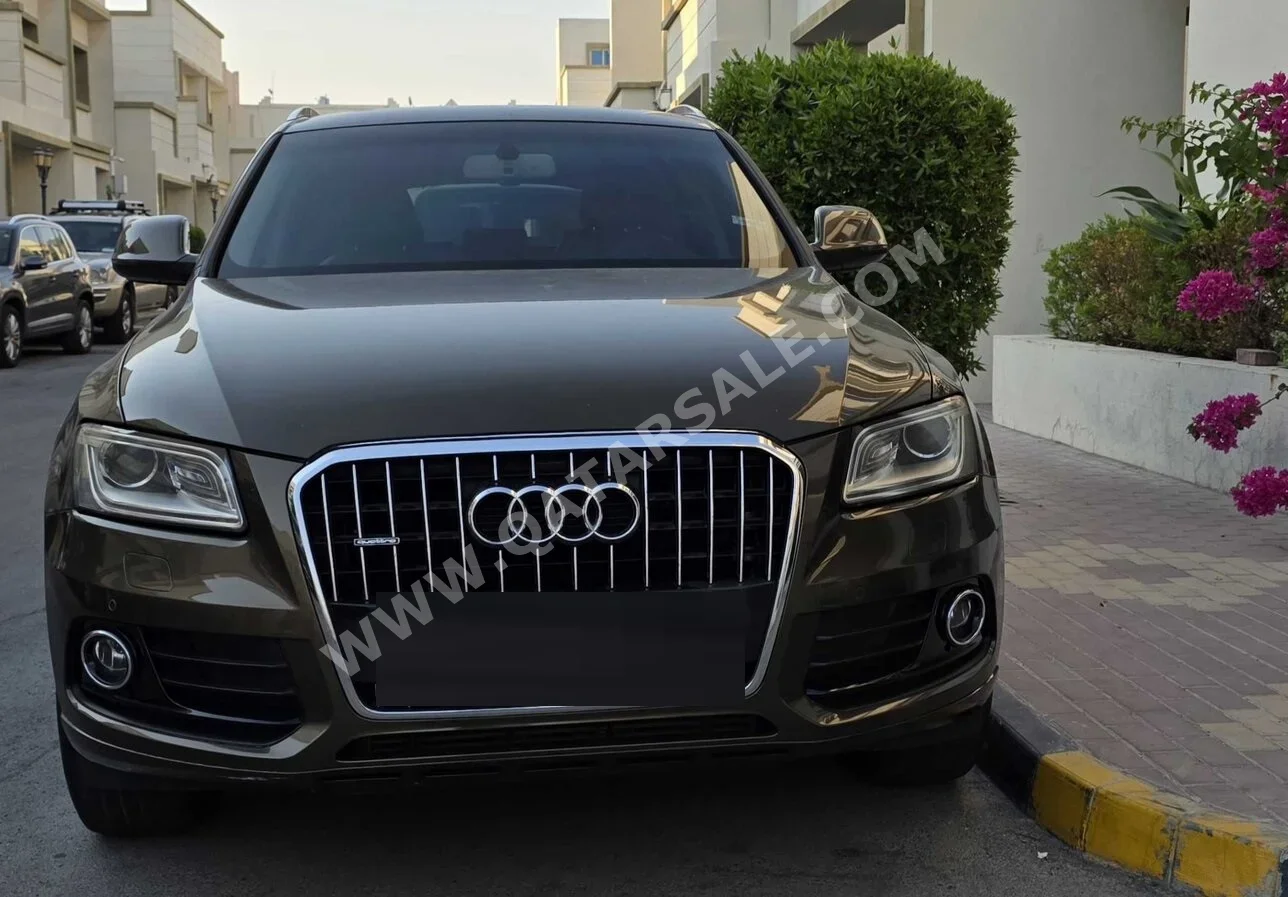 Audi  Q5  40 TFSI Quattro  2015  Automatic  92,150 Km  4 Cylinder  All Wheel Drive (AWD)  SUV  Brown