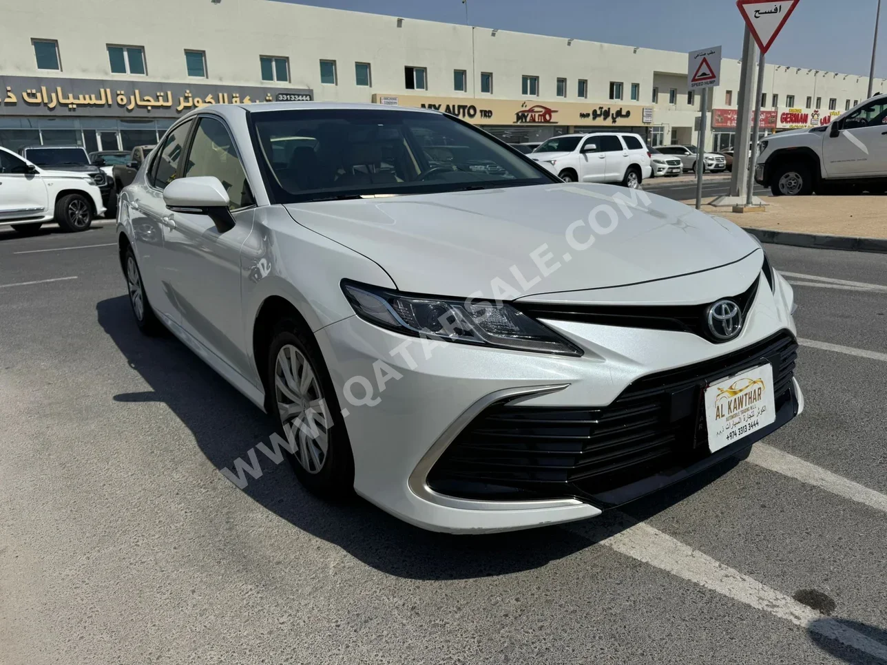 Toyota  Camry  LE  2022  Automatic  106,000 Km  4 Cylinder  Front Wheel Drive (FWD)  Sedan  White
