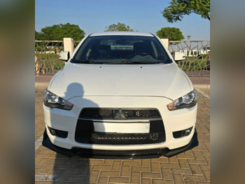 Mitsubishi  Lancer  EX  2015  Automatic  76,000 Km  4 Cylinder  Front Wheel Drive (FWD)  Sedan  White