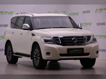 Nissan  Patrol  Platinum  2015  Automatic  240,000 Km  8 Cylinder  Four Wheel Drive (4WD)  SUV  White