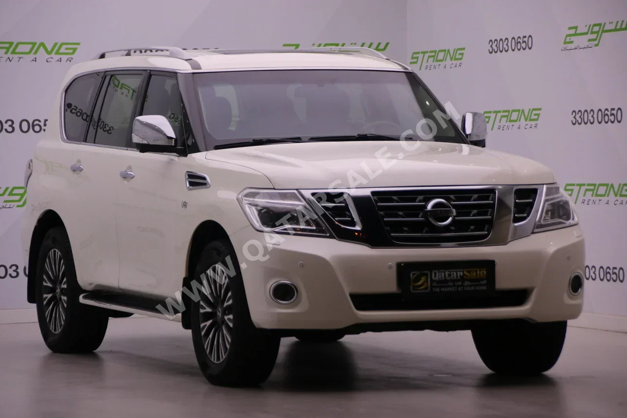 Nissan  Patrol  Platinum  2015  Automatic  240,000 Km  8 Cylinder  Four Wheel Drive (4WD)  SUV  White