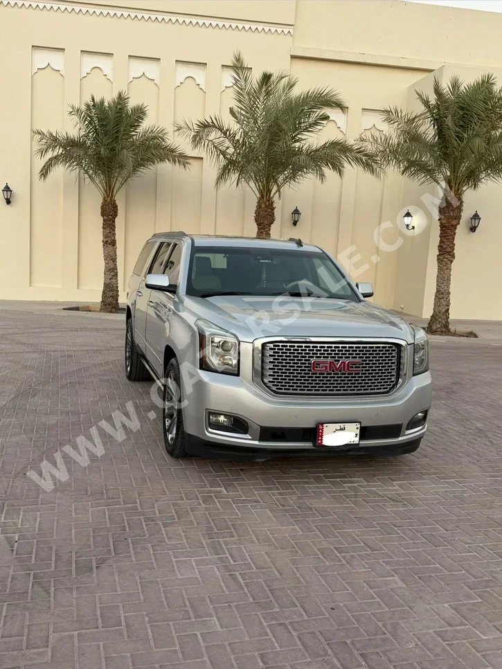 GMC  Yukon  Denali  2015  Automatic  200,000 Km  8 Cylinder  Four Wheel Drive (4WD)  SUV  Silver