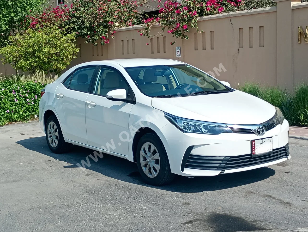Toyota  Corolla  2019  Automatic  105,000 Km  4 Cylinder  Front Wheel Drive (FWD)  Sedan  White