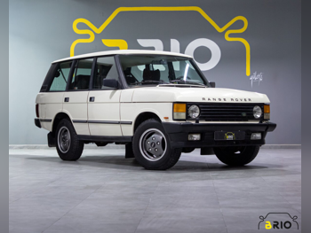 Land Rover  Range Rover  Vogue  1989  Automatic  165,000 Km  8 Cylinder  Four Wheel Drive (4WD)  SUV  White
