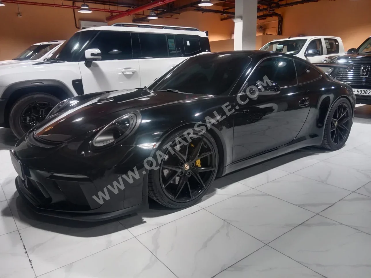 بورش  911  2014  عادي  90,000 كم  6 سلندر  دفع خلفي  كوبيه \ سبورت  أسود
