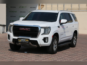 GMC  Yukon  SLE  2021  Automatic  42,000 Km  8 Cylinder  Rear Wheel Drive (RWD)  SUV  White  With Warranty