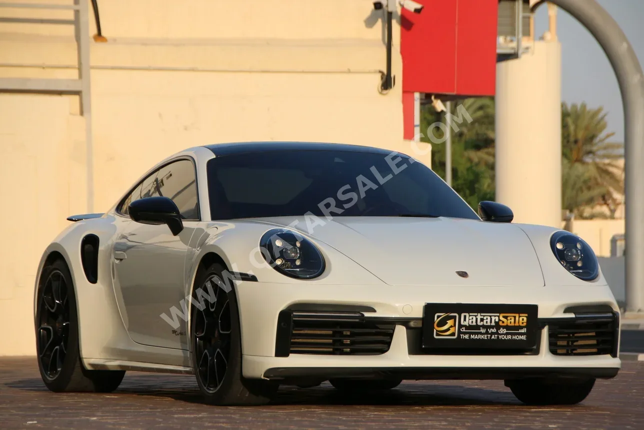 Porsche  911  Turbo  2021  Automatic  42,000 Km  6 Cylinder  Rear Wheel Drive (RWD)  Coupe / Sport  White  With Warranty