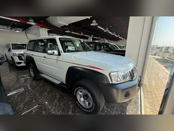 Nissan  Patrol  GL  2023  Automatic  0 Km  6 Cylinder  Four Wheel Drive (4WD)  SUV  White  With Warranty