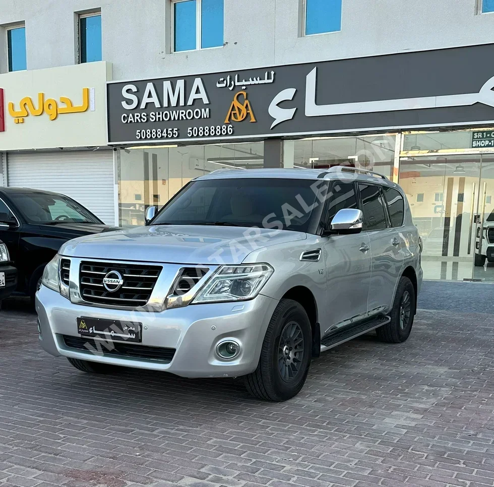 Nissan  Patrol  SE  2015  Automatic  269,000 Km  8 Cylinder  Four Wheel Drive (4WD)  SUV  Silver