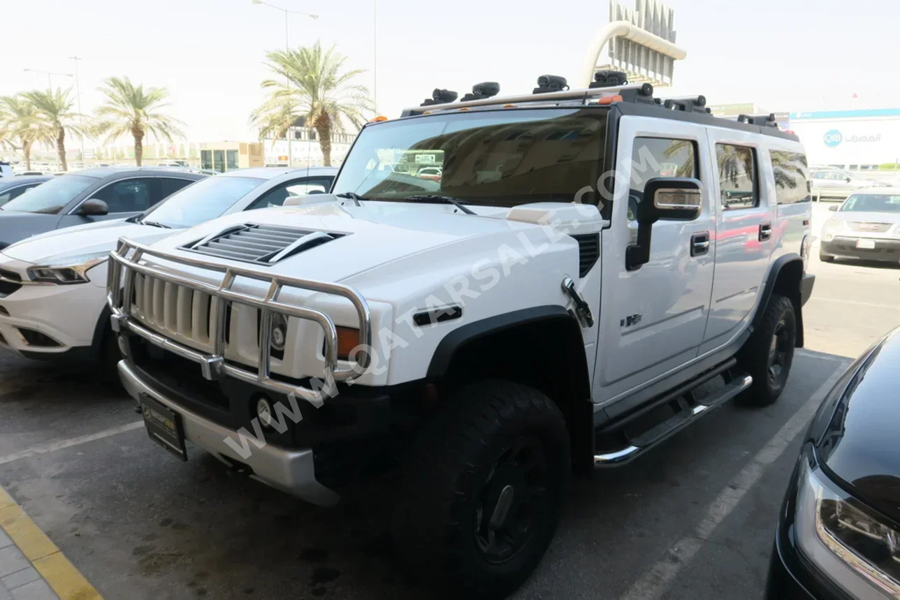 همر  اتش 2  2008  اوتوماتيك  250,000 كم  8 سلندر  دفع رباعي  اس يو في  أبيض