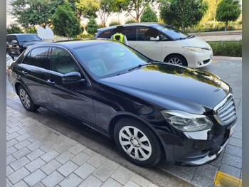 Mercedes-Benz  E-Class  200  2014  Automatic  105,000 Km  4 Cylinder  Rear Wheel Drive (RWD)  Sedan  Black