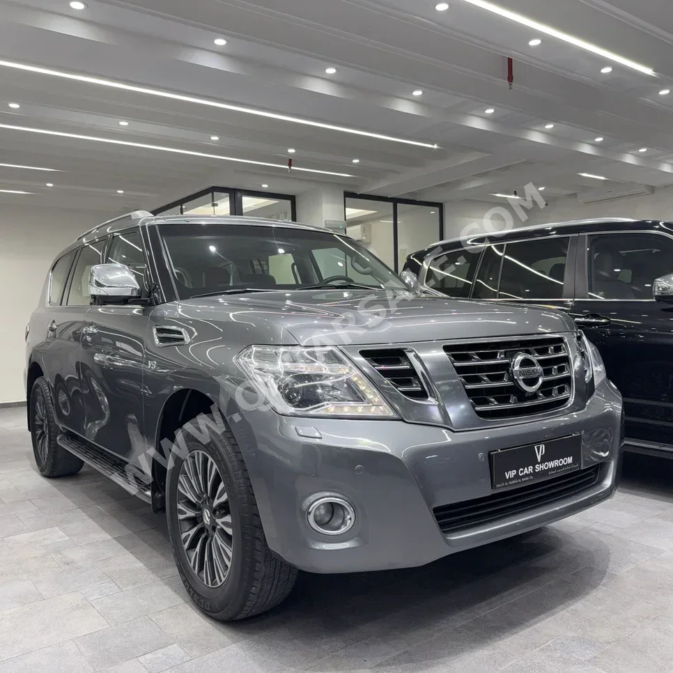 Nissan  Patrol  Platinum  2014  Automatic  213,000 Km  8 Cylinder  Four Wheel Drive (4WD)  SUV  Gray