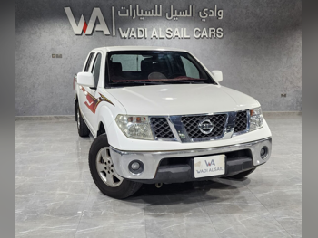 نيسان  نافارا  أس اي  2015  اوتوماتيك  208,000 كم  4 سلندر  دفع خلفي  بيكب  أبيض