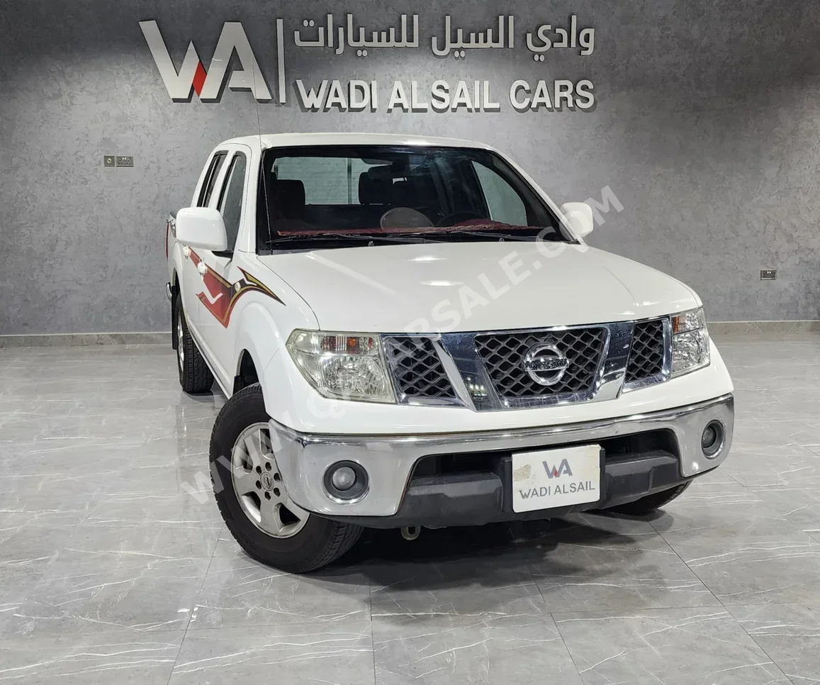 نيسان  نافارا  أس اي  2015  اوتوماتيك  208,000 كم  4 سلندر  دفع خلفي  بيكب  أبيض