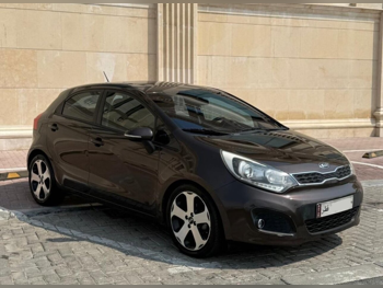 Kia  Rio  2015  Automatic  177,000 Km  4 Cylinder  Classic  Brown