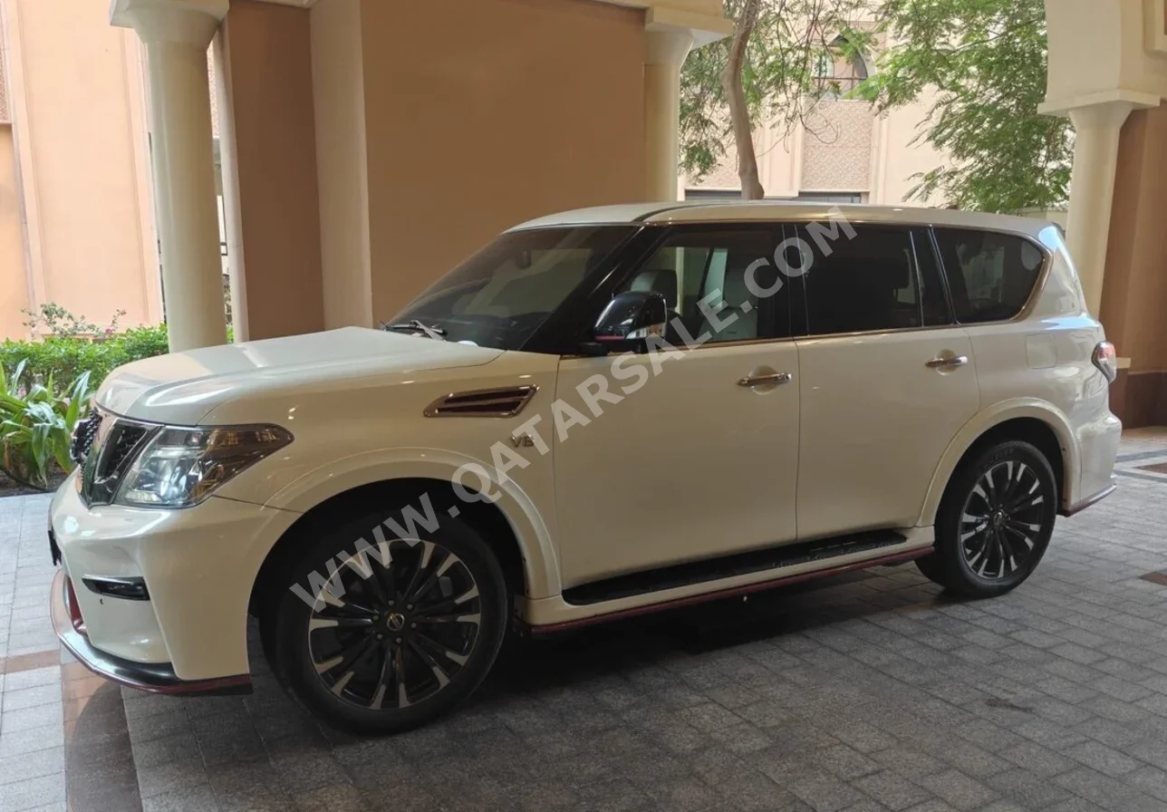 Nissan  Patrol  Nismo  2016  Automatic  161,000 Km  8 Cylinder  Four Wheel Drive (4WD)  SUV  White and Black