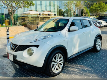 Nissan  Juke  Turbo  2014  Automatic  112,000 Km  4 Cylinder  Front Wheel Drive (FWD)  SUV  Pearl