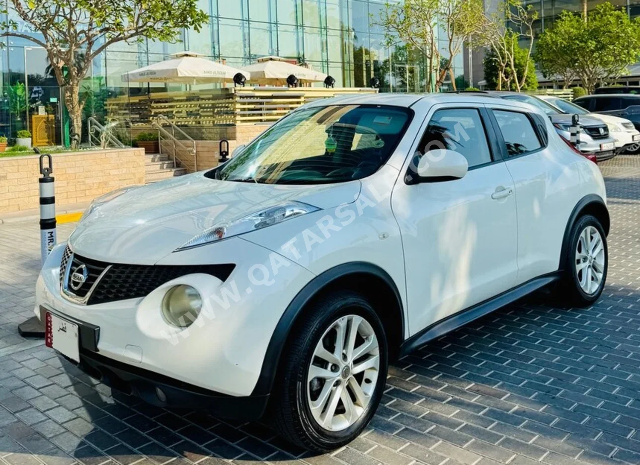Nissan  Juke  Turbo  2014  Automatic  112,000 Km  4 Cylinder  Front Wheel Drive (FWD)  SUV  Pearl