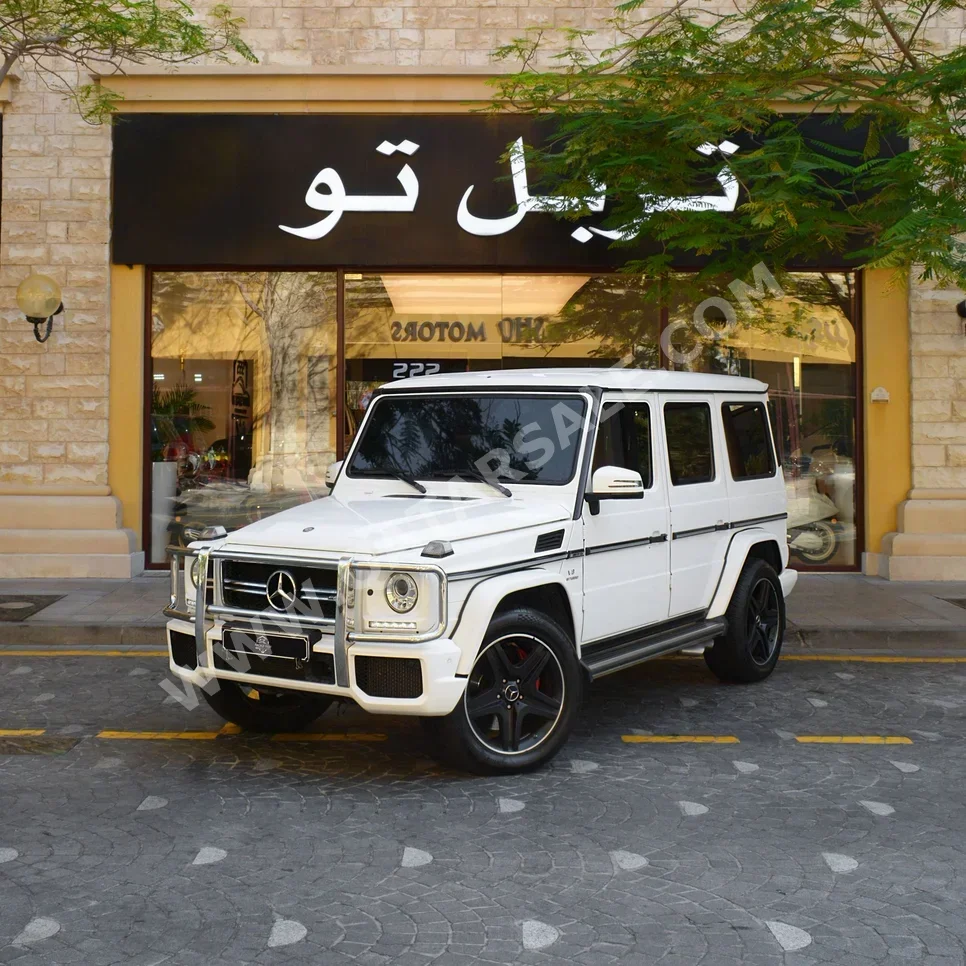 مرسيدس - بنز  جي - كلاس  63 اي ام جي  2015  اوتوماتيك  81,450 كم  8 سلندر  دفع رباعي  اس يو في  أبيض