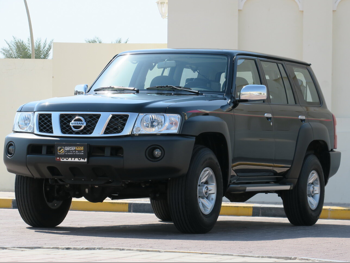 Nissan  Patrol  Safari  2023  Manual  22,000 Km  6 Cylinder  Four Wheel Drive (4WD)  SUV  Black  With Warranty