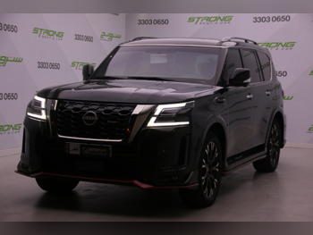 Nissan  Patrol  SE  2014  Automatic  62,000 Km  8 Cylinder  Four Wheel Drive (4WD)  SUV  Black