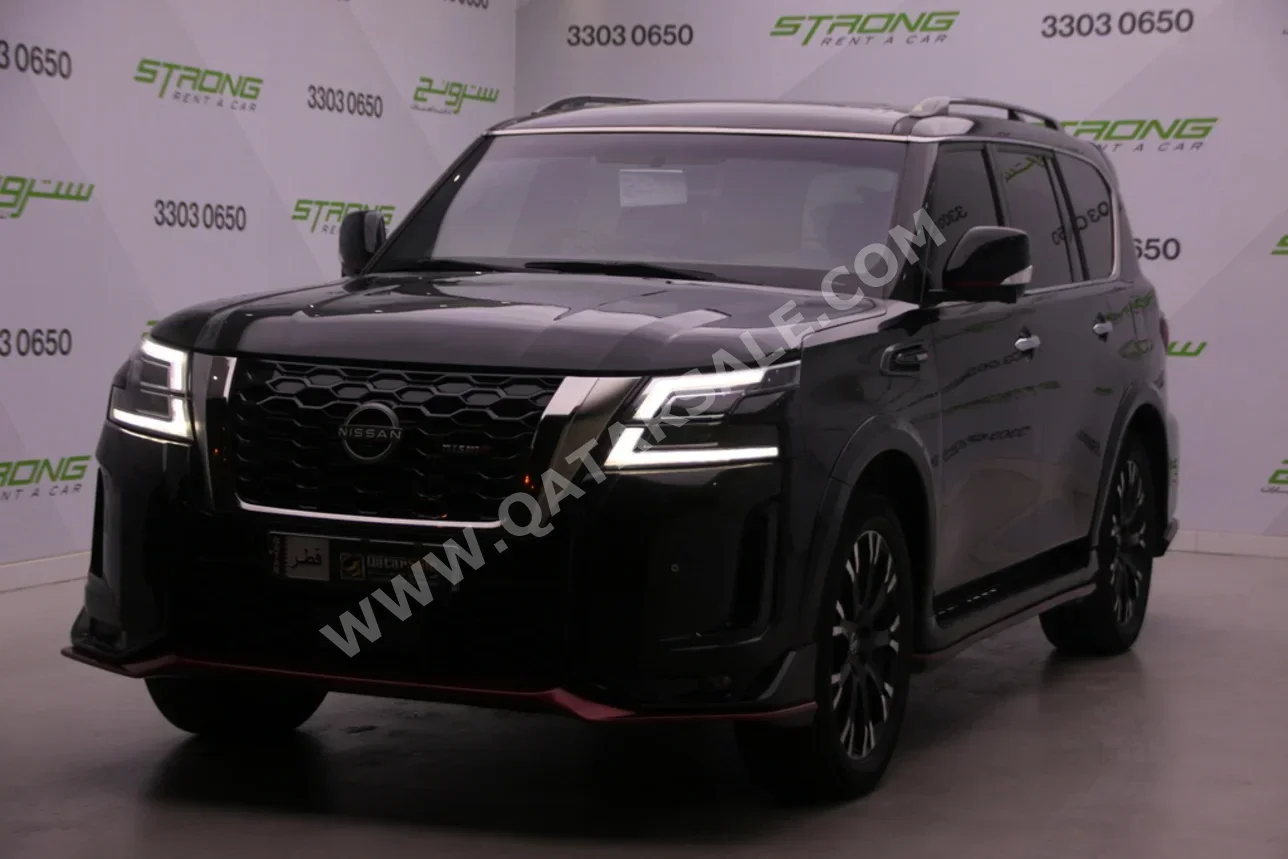 Nissan  Patrol  SE  2014  Automatic  62,000 Km  8 Cylinder  Four Wheel Drive (4WD)  SUV  Black
