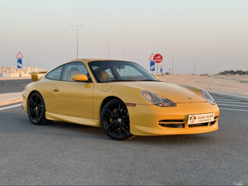 بورش  911  كاريرا  2001  اوتوماتيك  181,000 كم  6 سلندر  دفع خلفي  كوبيه \ سبورت  أصفر