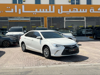 Toyota  Camry  GL  2015  Automatic  124,000 Km  4 Cylinder  Front Wheel Drive (FWD)  Sedan  White