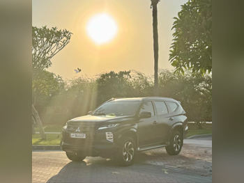 Mitsubishi  Pajero  Montero Sport  2024  Automatic  8,800 Km  6 Cylinder  Four Wheel Drive (4WD)  SUV  Black  With Warranty