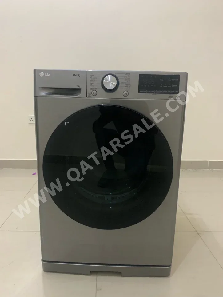 غسالة ملابس & الكل في واحد ال جي  T \  وحدة كومبو الكل في واحد  اللون الرمادي  اي ++