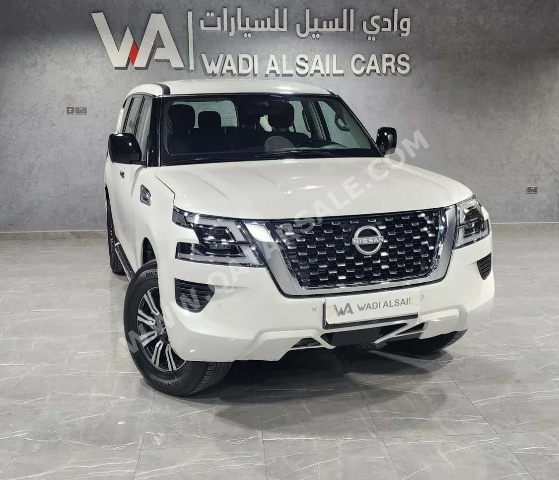 نيسان  باترول  أكس أي  2022  اوتوماتيك  129,000 كم  6 سلندر  دفع رباعي  اس يو في  أبيض