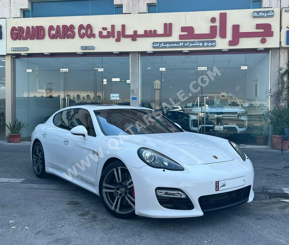 Porsche  Panamera  GTS  2013  Automatic  144,000 Km  8 Cylinder  Rear Wheel Drive (RWD)  Sedan  White
