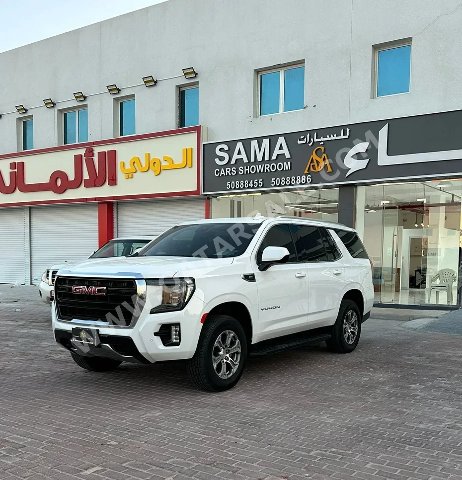 GMC  Yukon  SLE  2023  Automatic  15,000 Km  8 Cylinder  Rear Wheel Drive (RWD)  SUV  White
